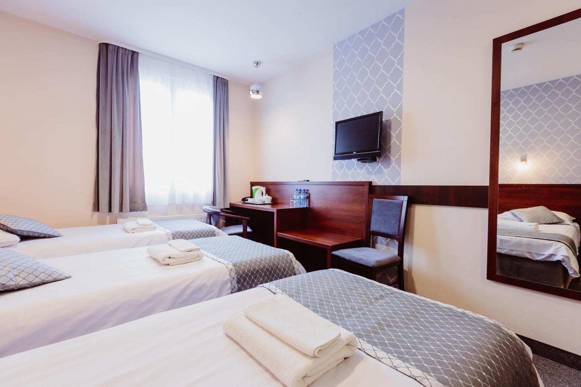 Dreibettzimmer