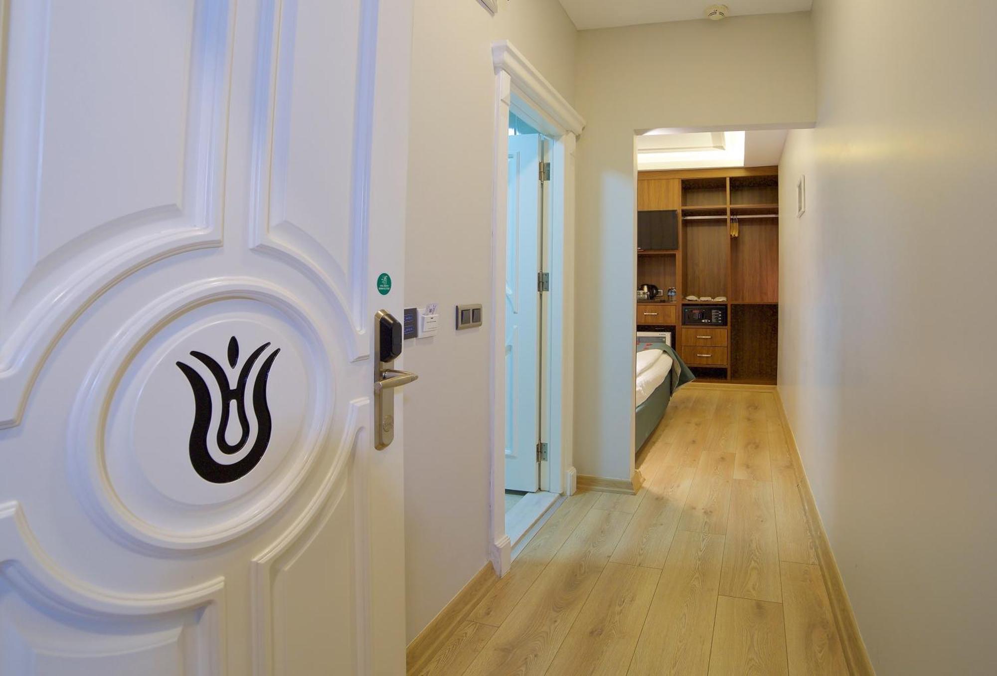 Deluxe Dreibettzimmer mit Balkon