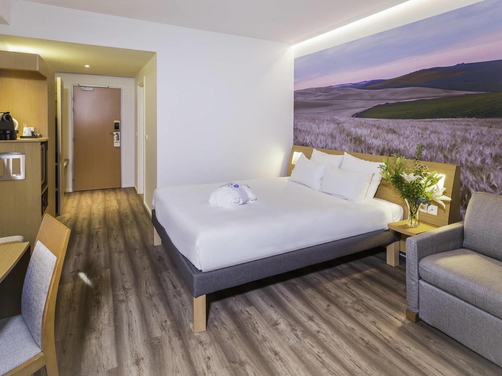 Executive Zimmer mit einem Queensize-Bett und einem Schlafsofa