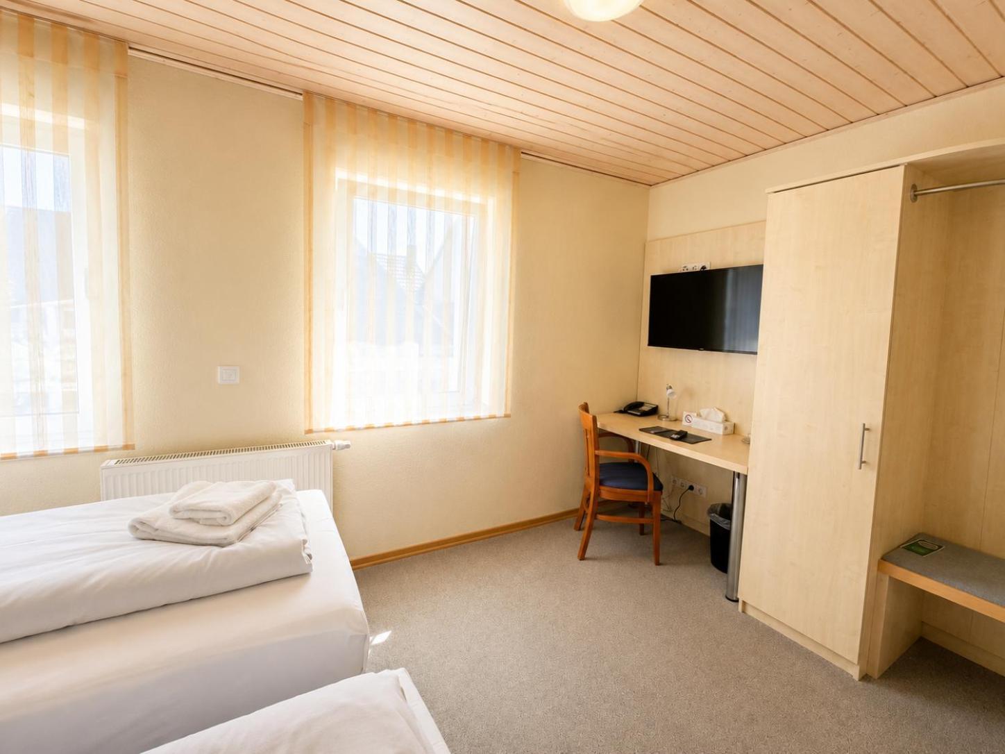 Zweibettzimmer mit eigenem Bad