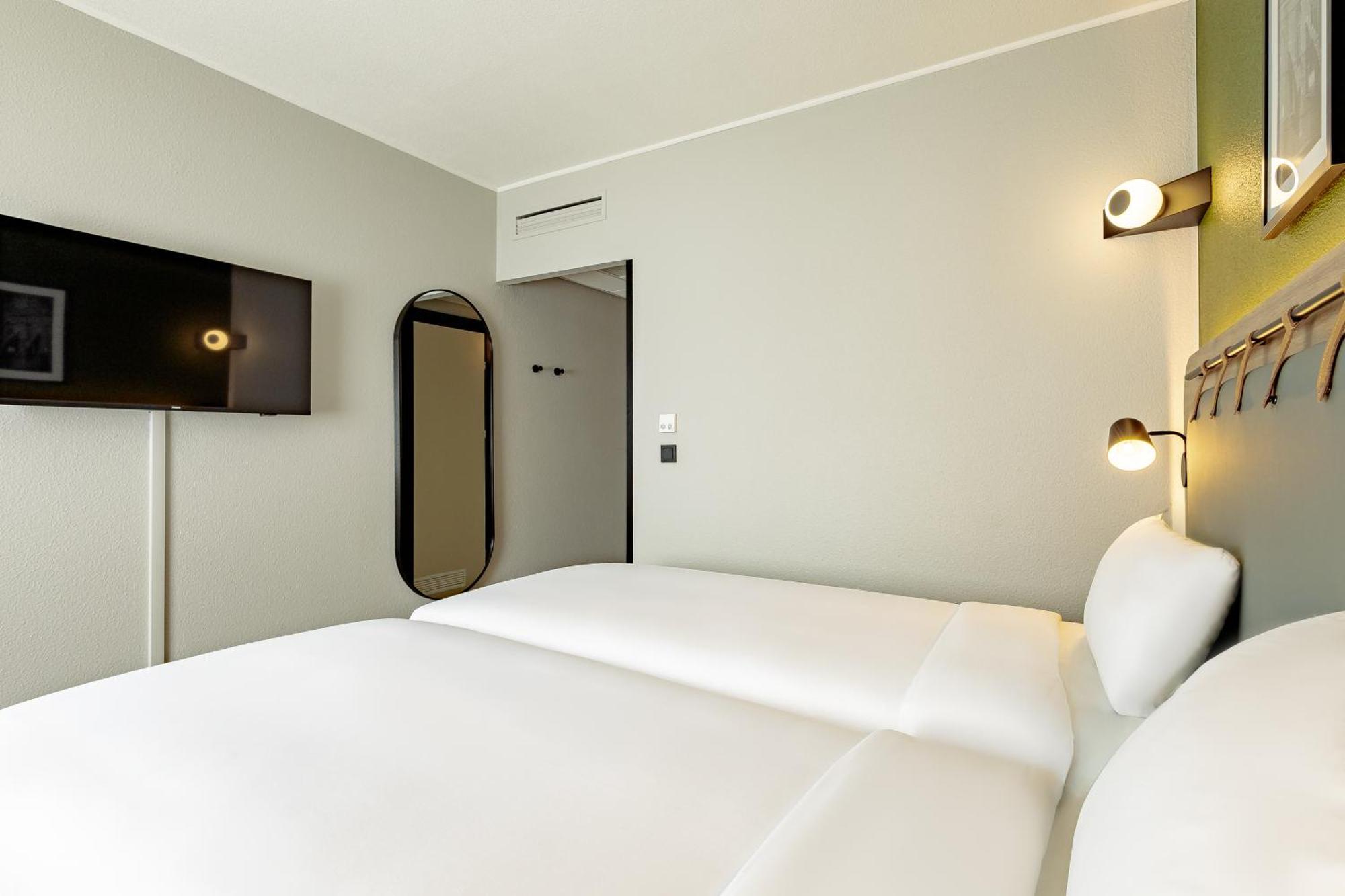 Junior Suite with One Queen Bed and One Double Sofa Bed