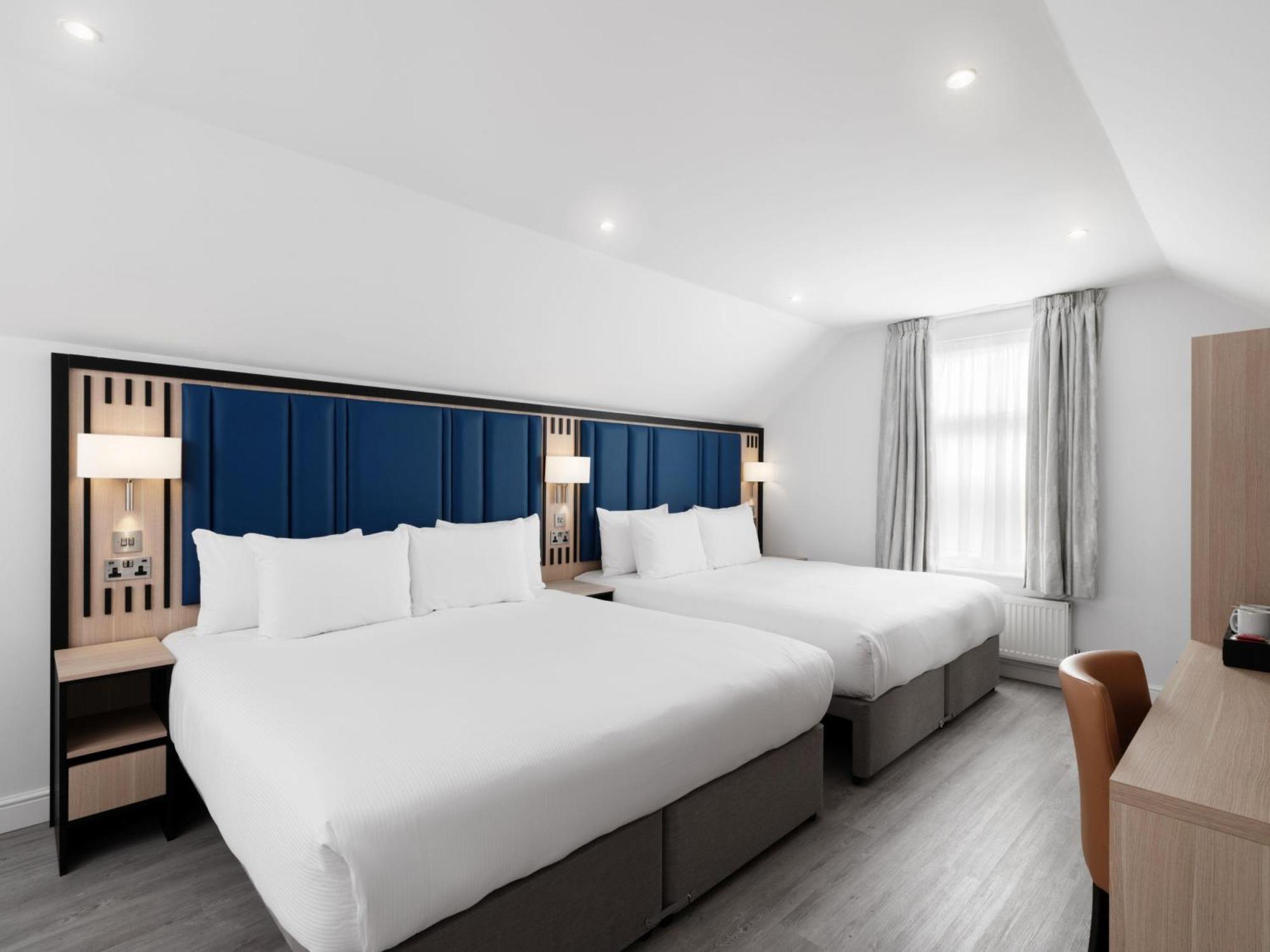 Zimmer mit 2 Kingsize-Betten