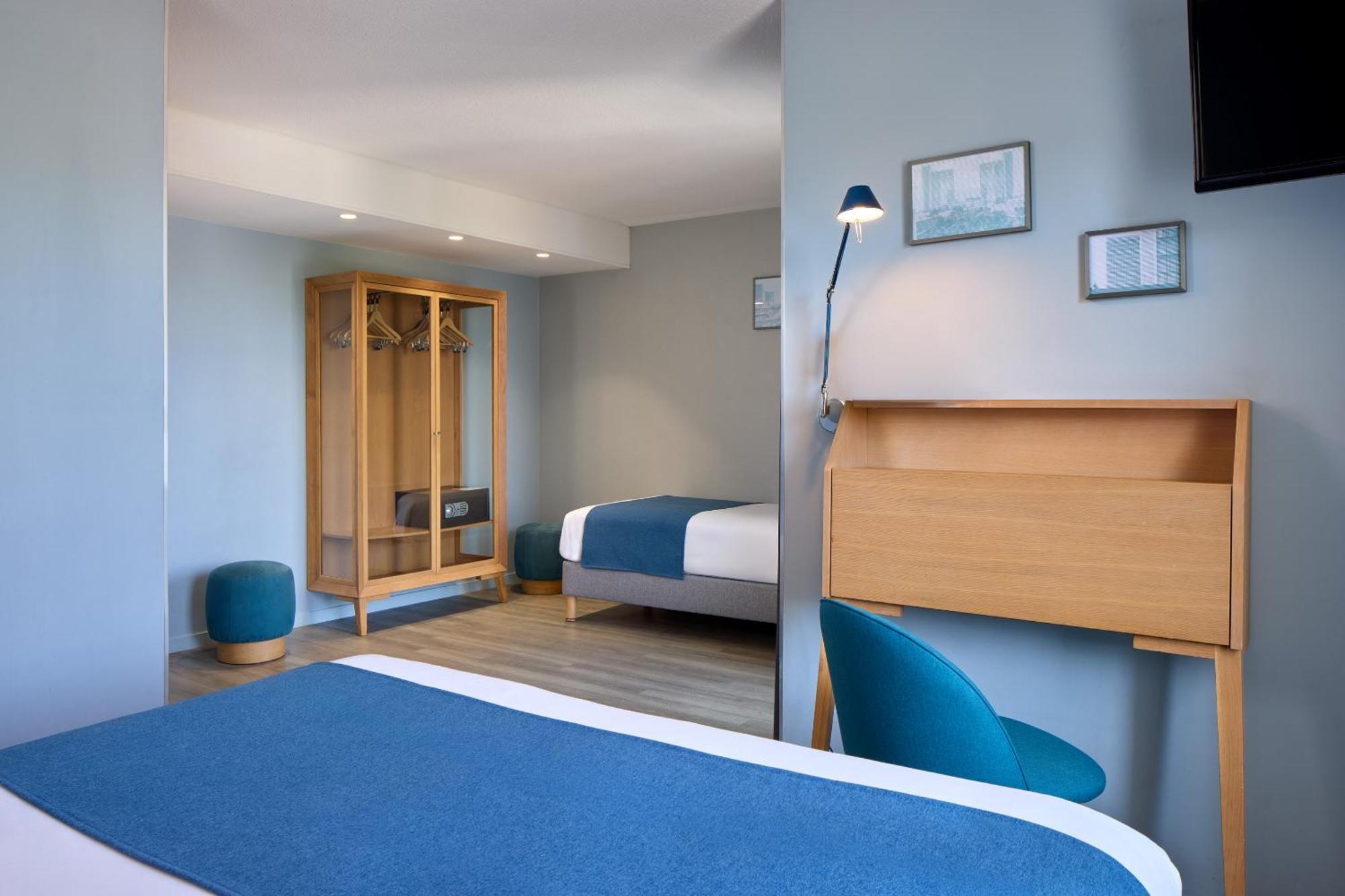 Dreibettzimmer mit Balkon
