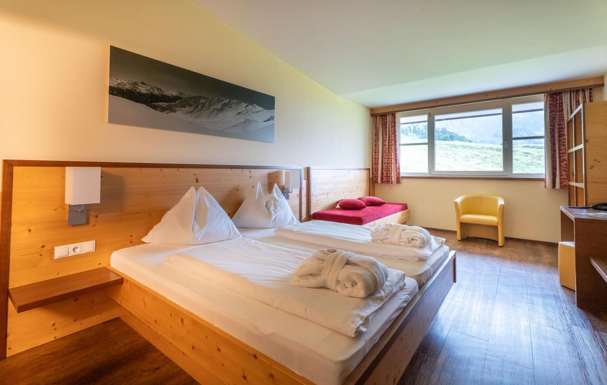 Familienzimmer mit Bergblick