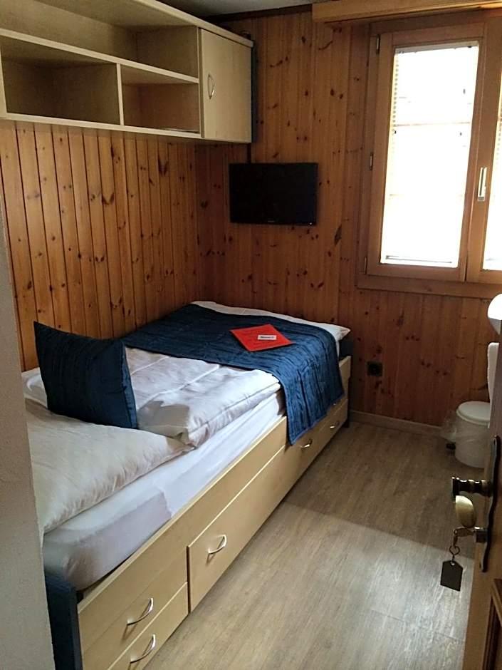 Einzelzimmer mit Gemeinschaftsbad
