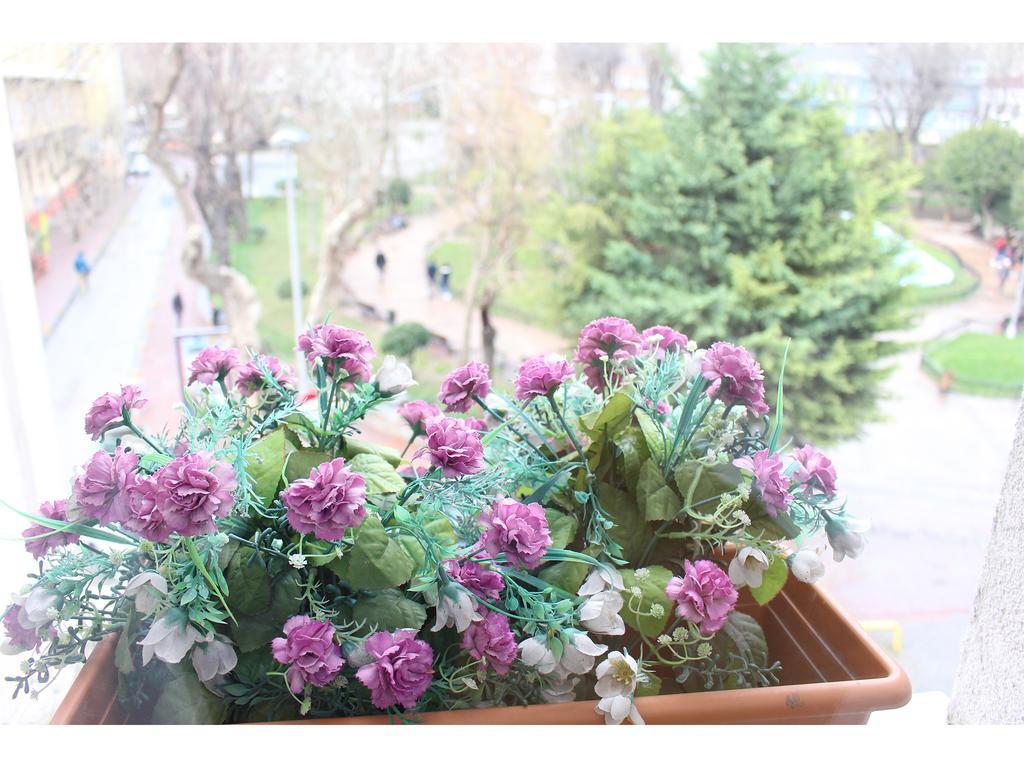 Dreibettzimmer mit Gartenblick