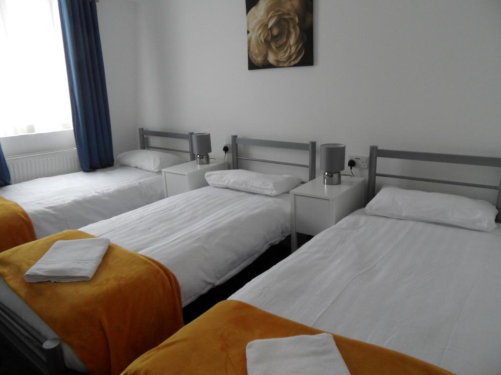 Budget Dreibettzimmer mit Zugang zum Gemeinschaftsbad