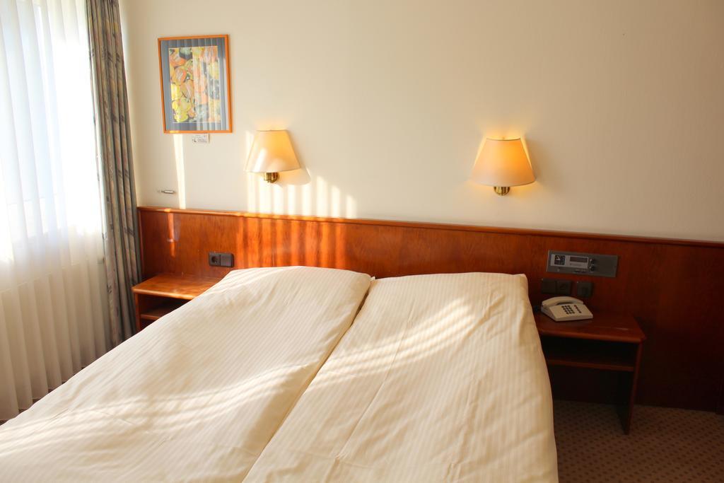 Doppel- oder Zweibettzimmer
