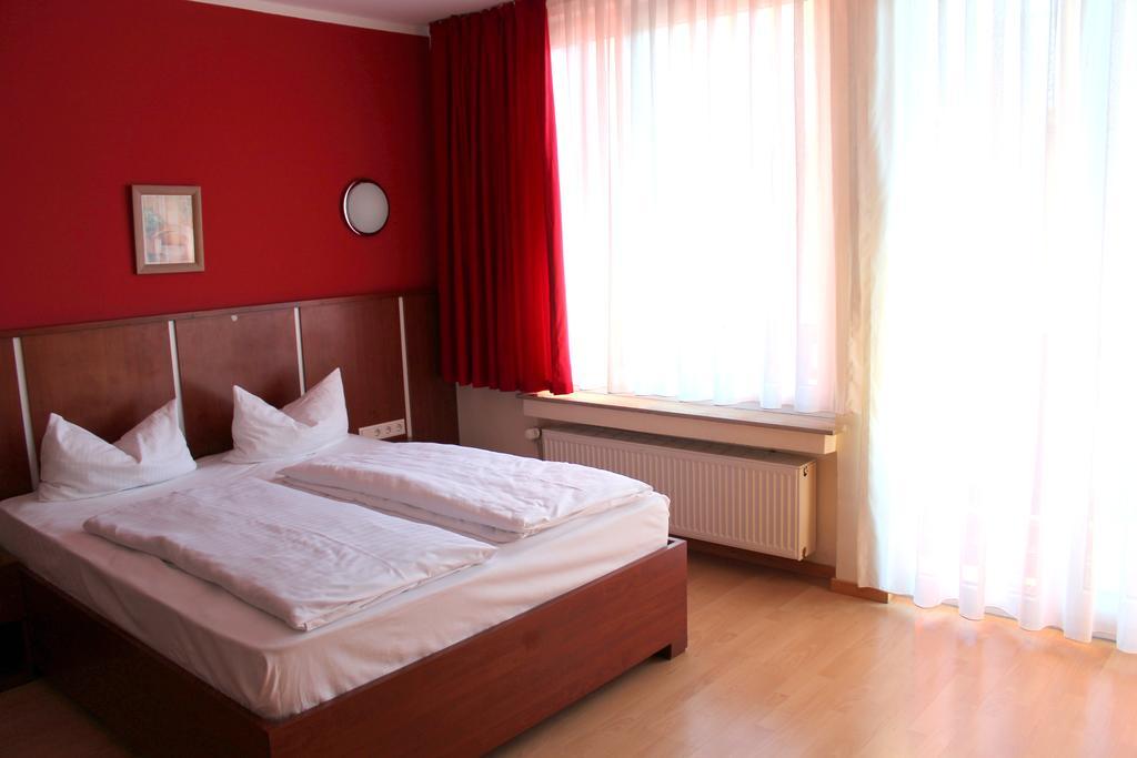 Dreibettzimmer mit Balkon