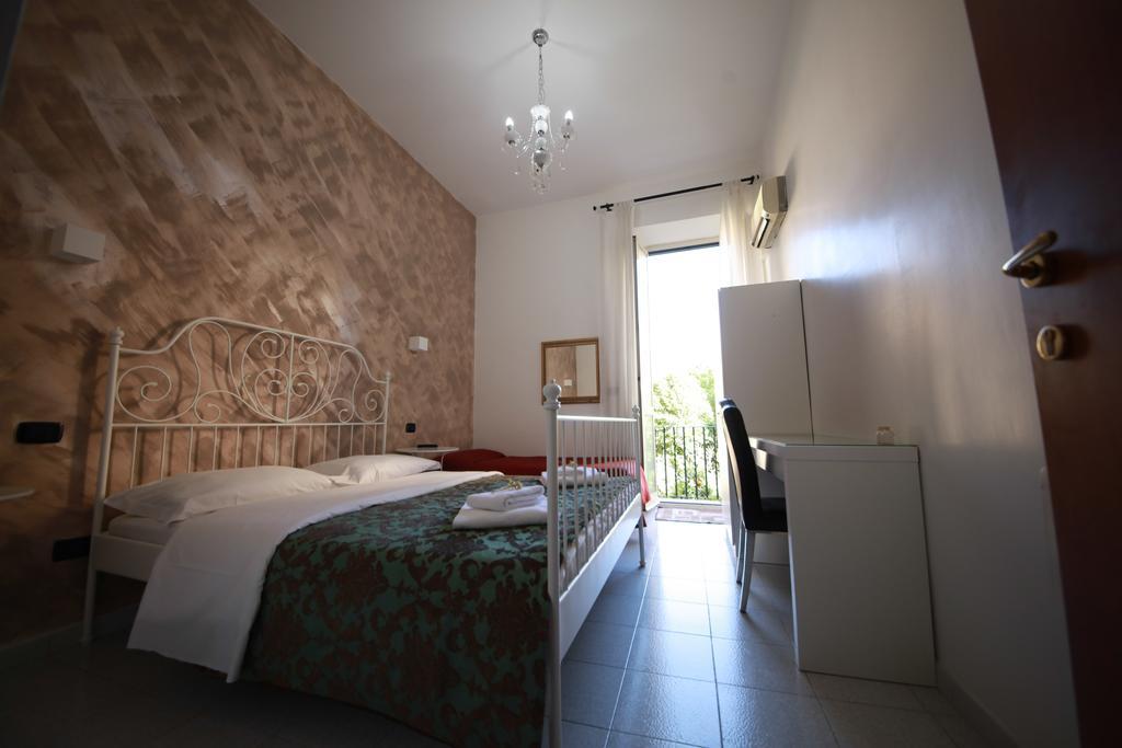 Dreibettzimmer mit Balkon