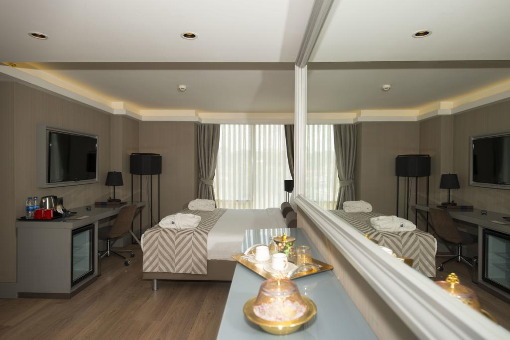 Suite mit Kingsize-Bett und Meerblick