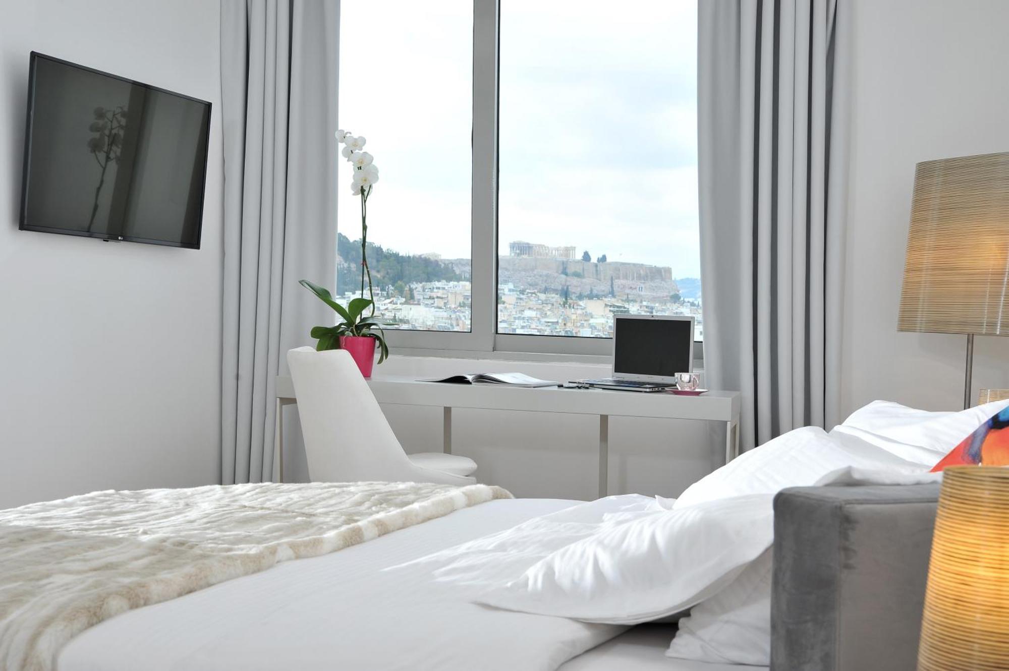 Deluxe Zimmer mit Kingsize-Bett und Blick auf die Akropolis