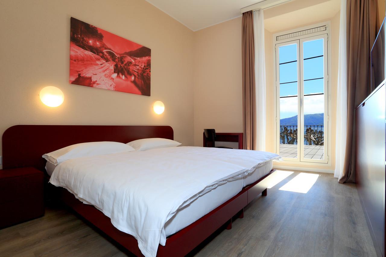Zweibettzimmer mit Terrasse und Seeblick