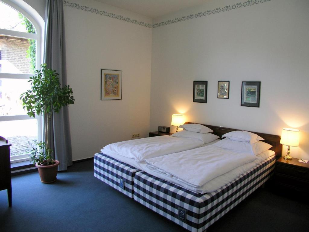 Doppel- oder Zweibettzimmer
