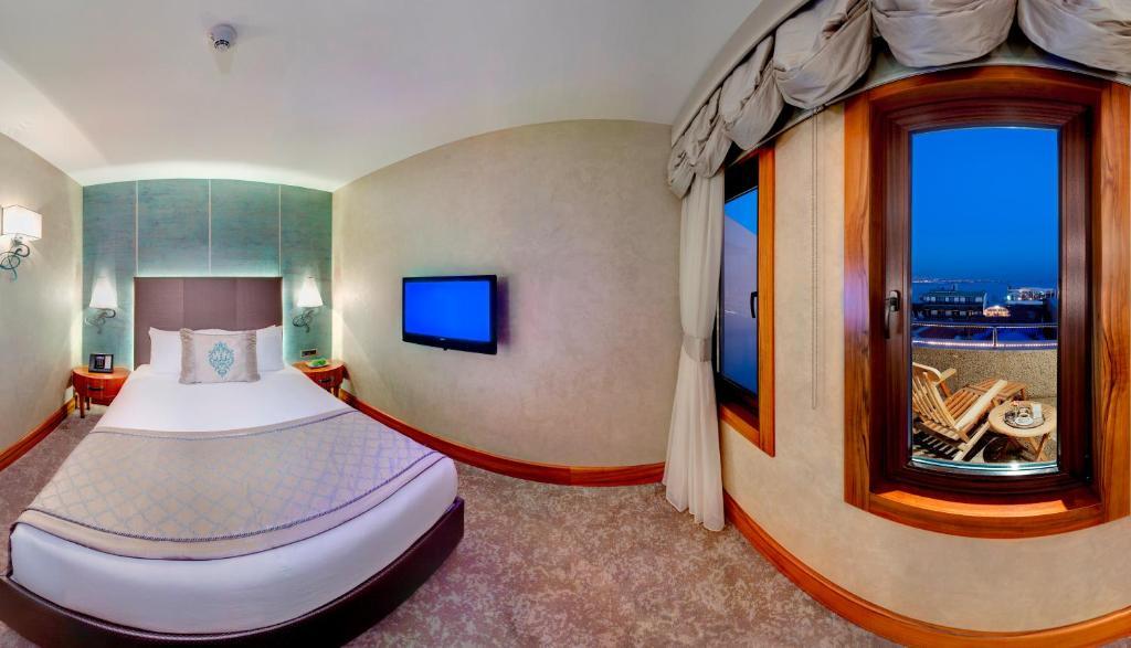 Doppelzimmer mit Balkon und Meerblick