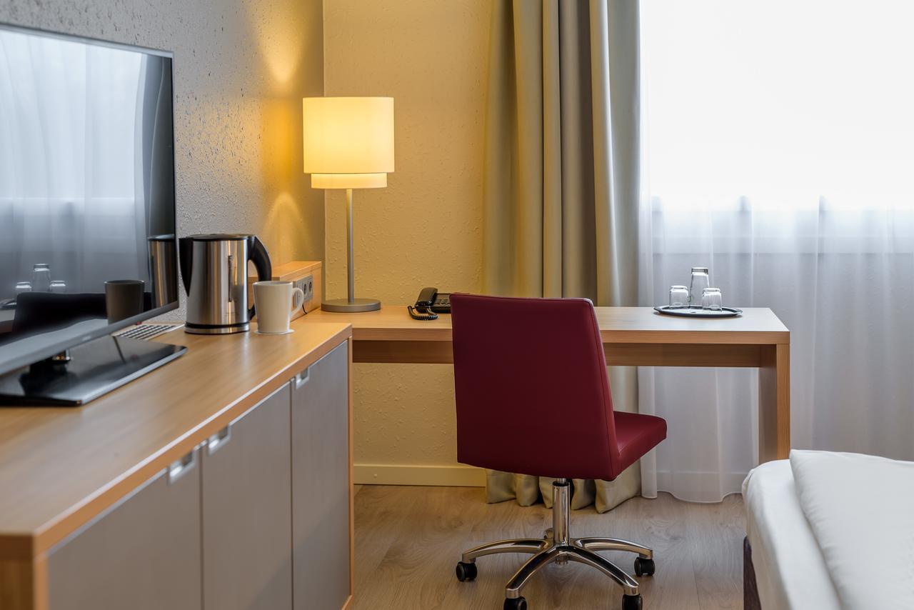 Standard Zimmer mit 2 Einzelbetten und 1 Sofa