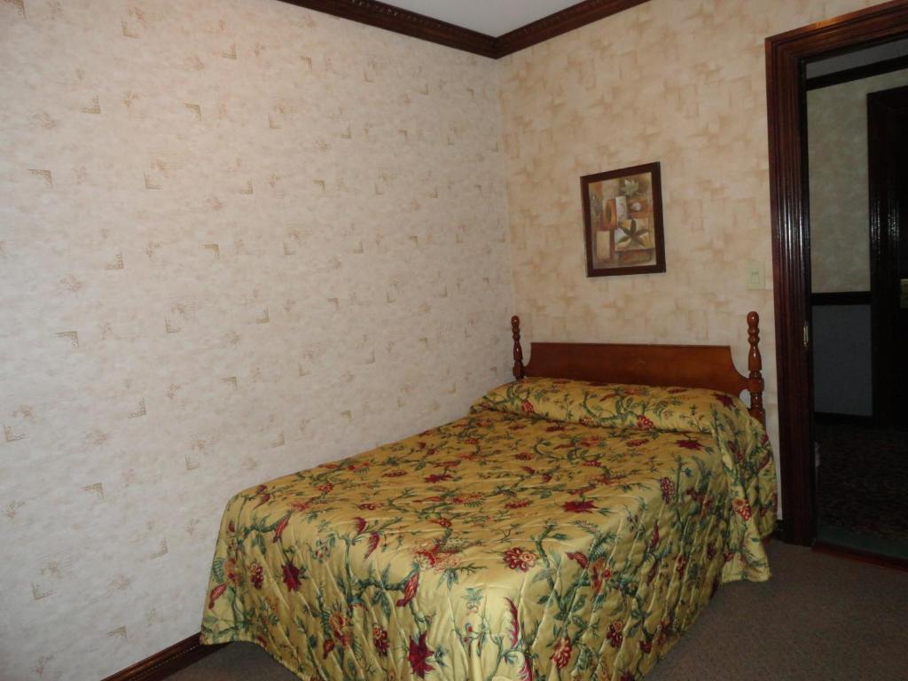 Zimmer mit Queensize-Bett und Gemeinschaftsbad