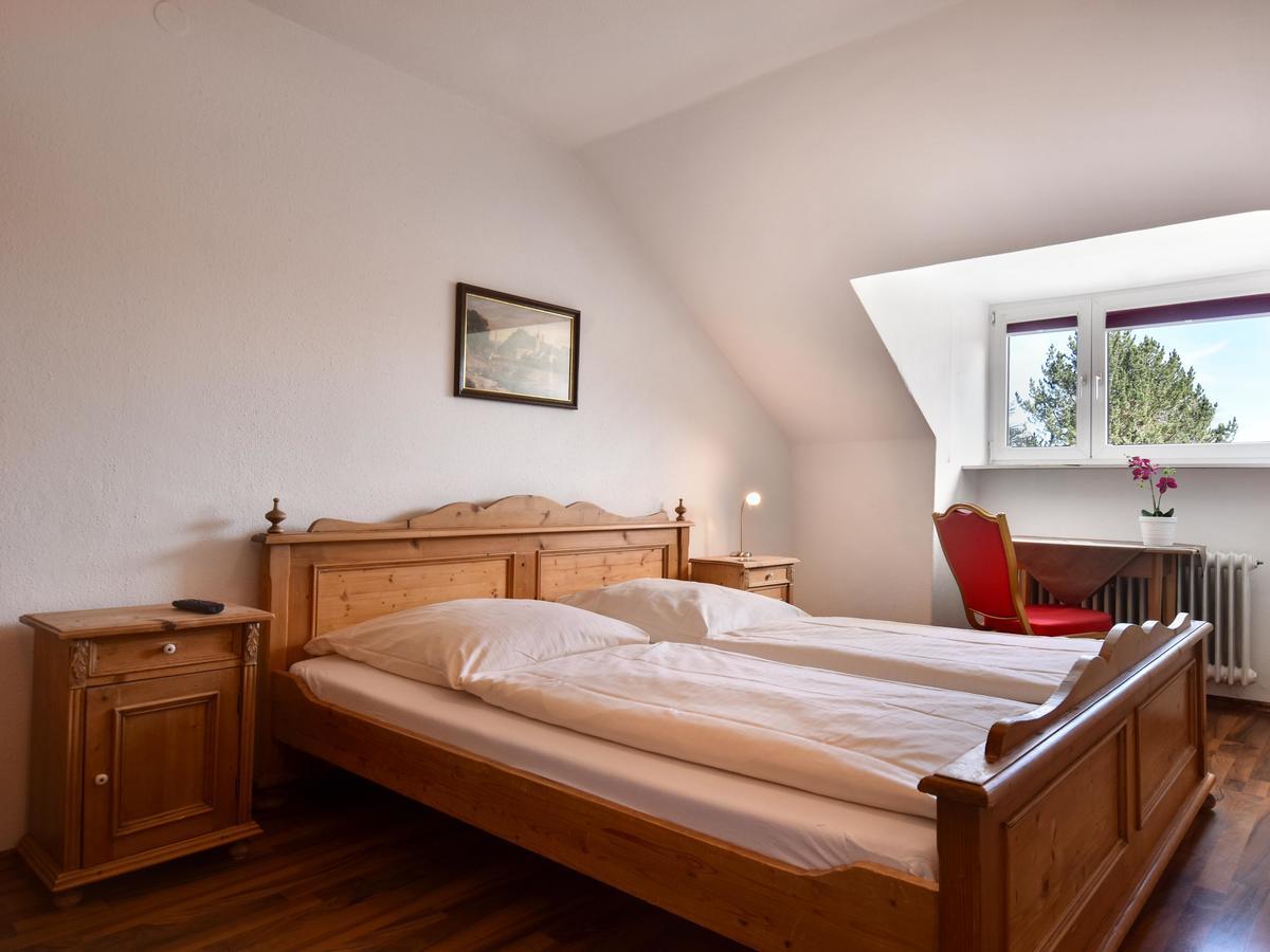 Doppelzimmer mit Gemeinschaftsdusche und -WC