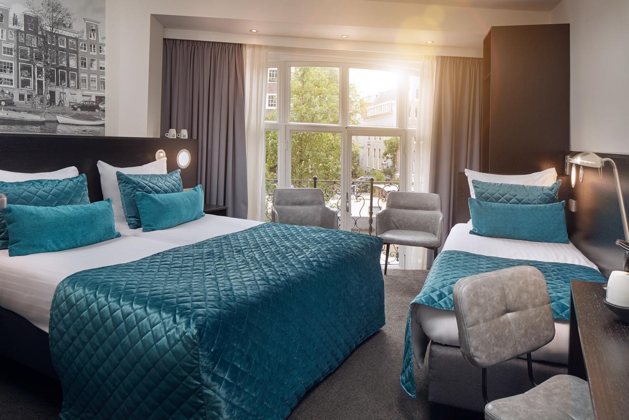 Dreibettzimmer mit Kanalblick
