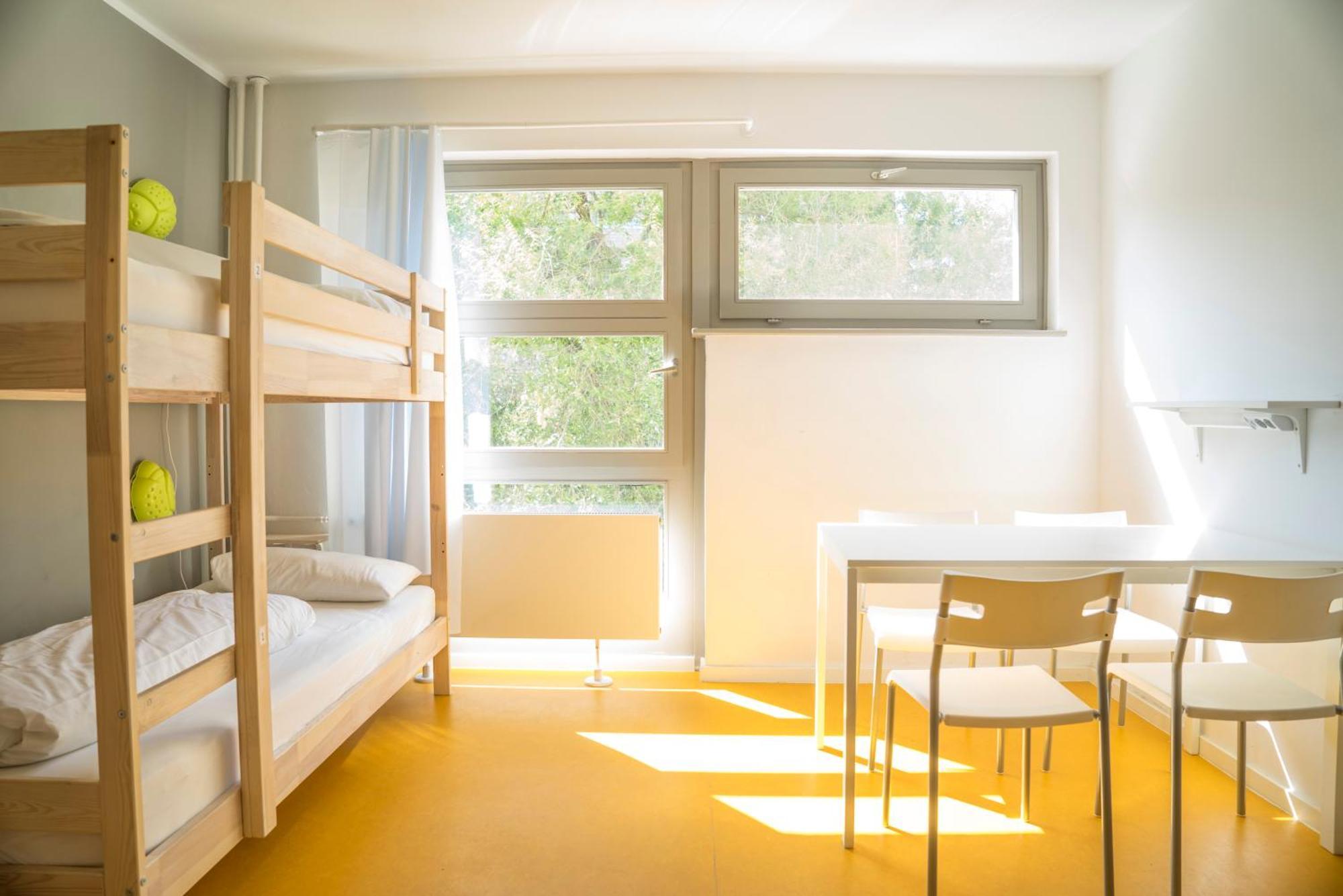 Bett im 4-Bett-Schlafsaal mit Gemeinschaftsbad