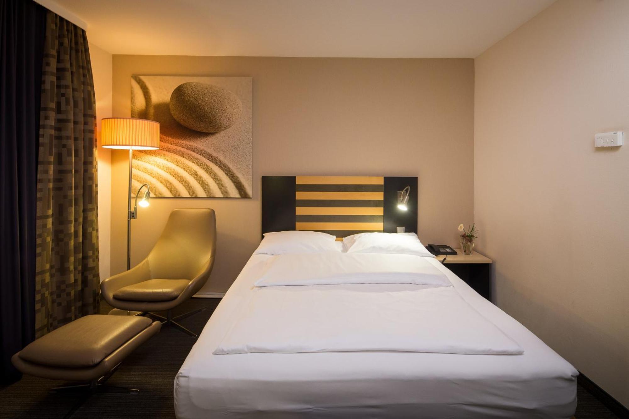 Zimmer mit Queensize-Bett