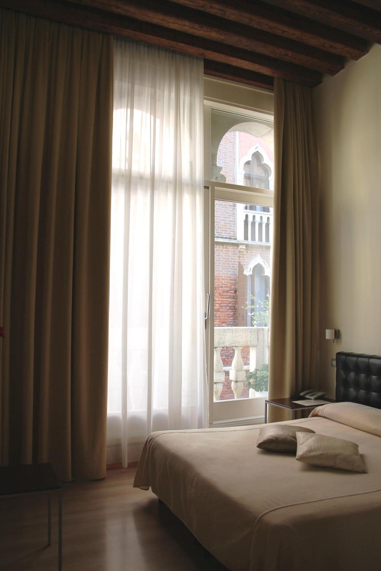 Deluxe Doppel-/Zweibettzimmer mit Balkon