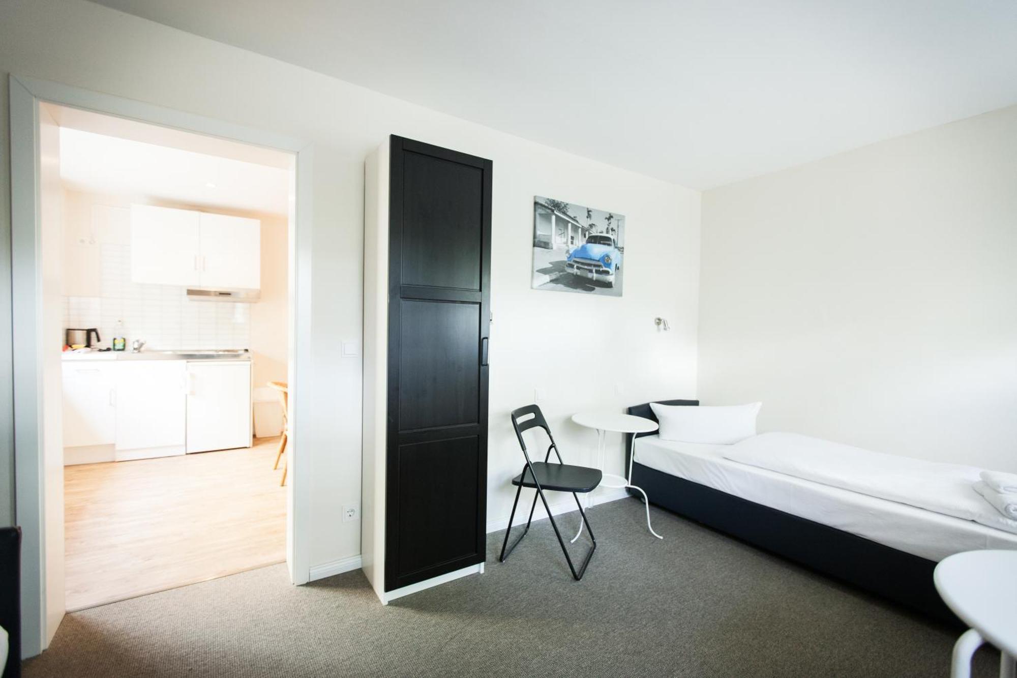 Doppel- oder Zweibettzimmer mit Gemeinschafts-WC