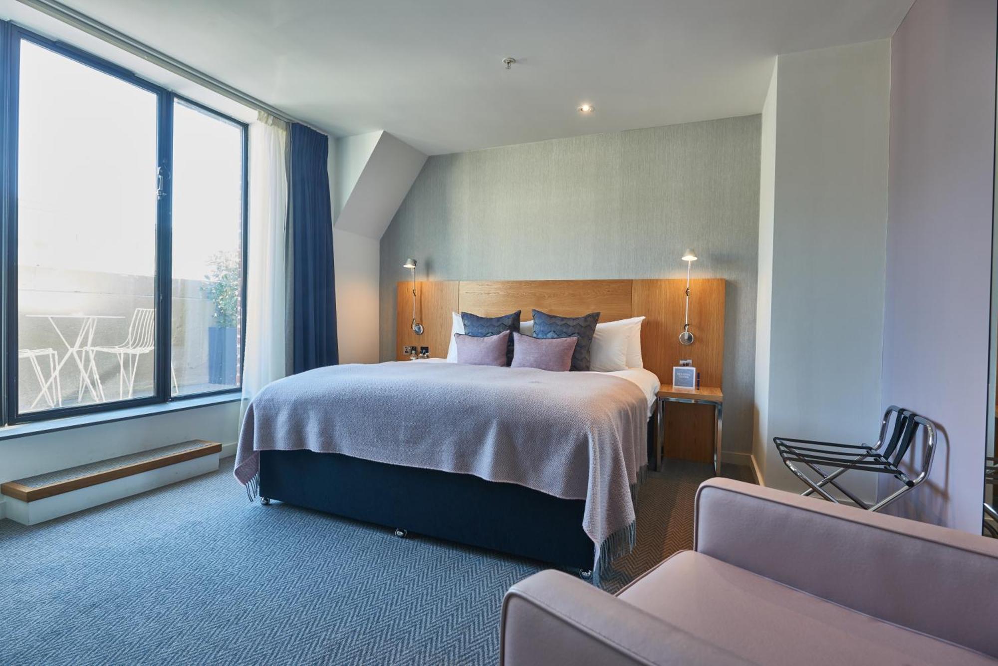 Deluxe Zimmer mit Kingsize-Bett und Balkon