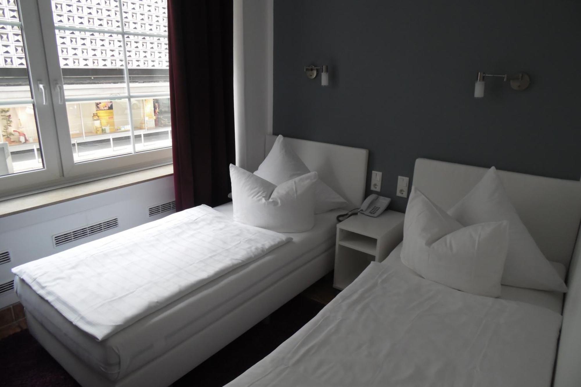 Doppel- oder Zweibettzimmer