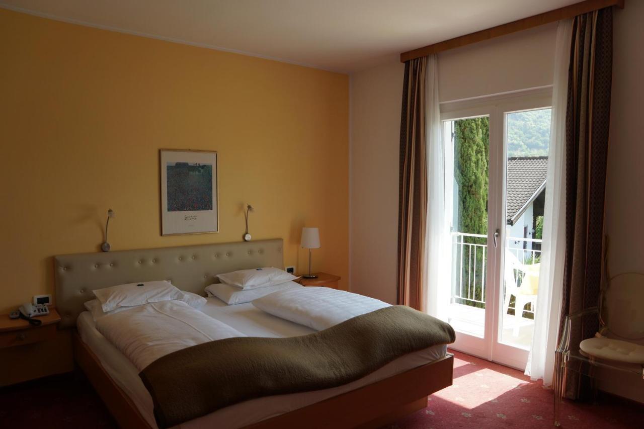 Doppelzimmer mit Balkon und Gartenblick