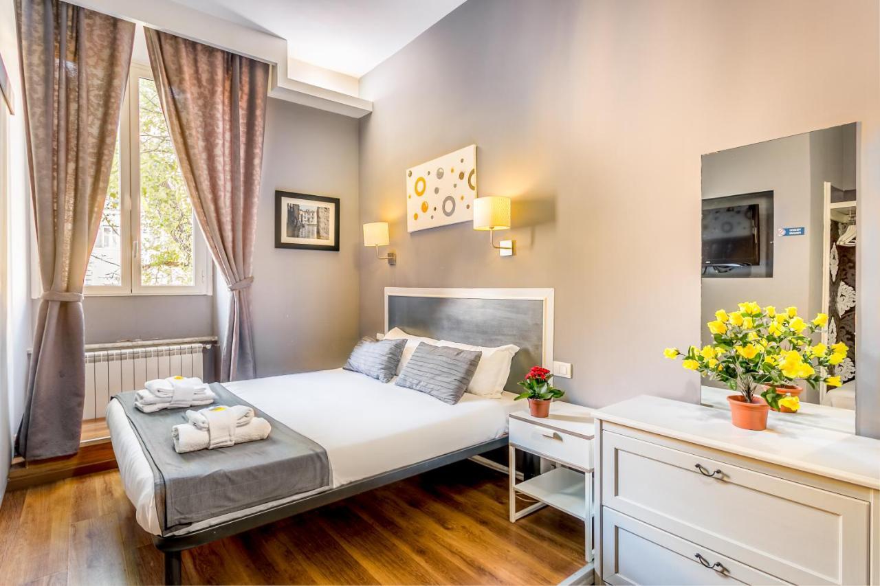 Dreibettzimmer mit Gartenblick