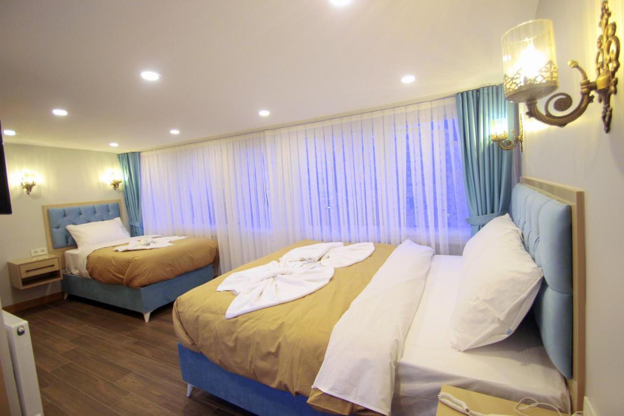 Deluxe Dreibettzimmer