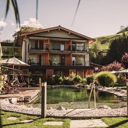Wellness und Brunch Hotel MorgenZeit beheizter Naturteich Genuss Frühstück bis 13 Uhr Hochkönig Sommercard-3